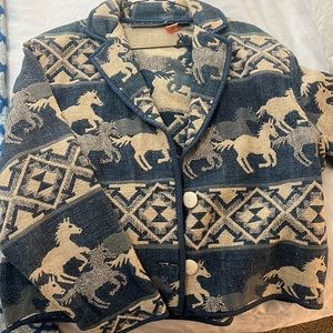 blue and white vintage jacket with western motif, size large.
